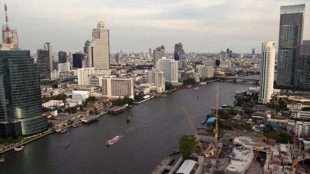 Day to night, Boat traffic on Chao Phraya river in Bangkok, Thailand, time lapse
