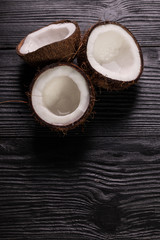Fototapeta na wymiar Coconut on wooden table.