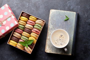 Colorful macaroons and coffee