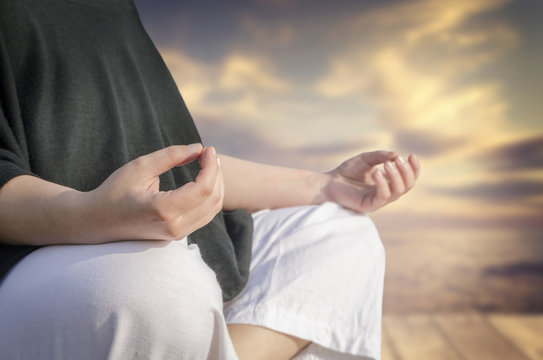 Closeup of woman's hands meditating. Yoga and meditation concept