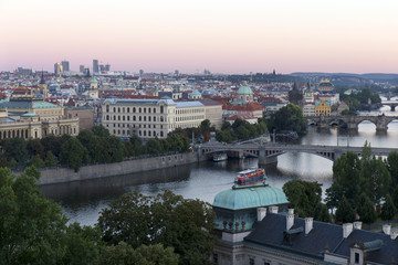 Evening Prague City with its Bridges and Towers above River Vltava, Czech Republic