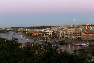 Obraz premium Evening Prague City with its Bridges and Towers above River Vltava, Czech Republic