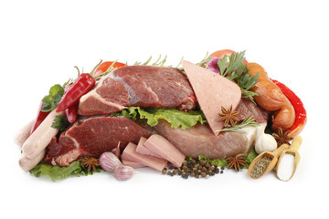 beef, pork and sausages with vegetables isolated