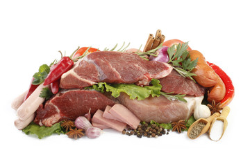 beef, pork and sausages with vegetables isolated