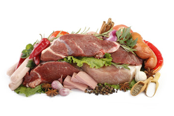 beef, pork and sausages with vegetables isolated