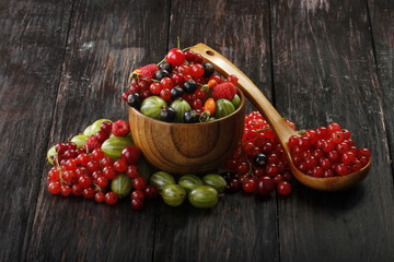 fruits and berriea on wooden background