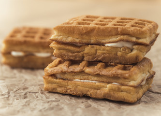 Golden waffles with cream