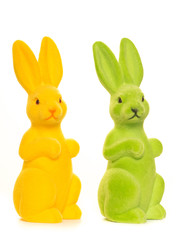 Yellow and green standing easter bunny's isolated on a white background