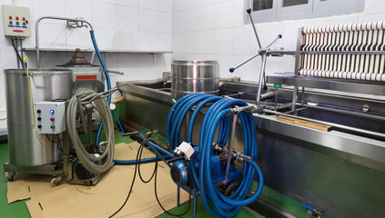 Closeup of washing and crushing olive devices