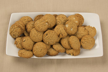 Group of cookies on the plate. Integral Cookies.