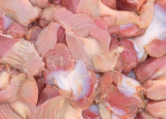 Close view of fresh chicken gizzards and hearts
