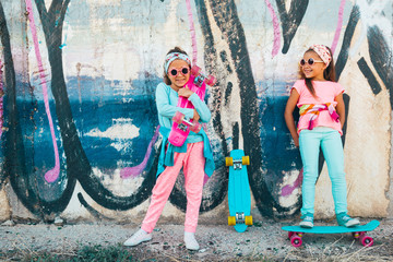 Obraz na płótnie Canvas Colorful children with skateboards