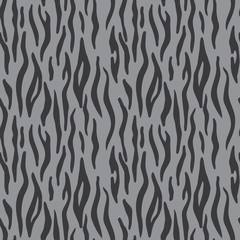 Fototapeta na wymiar Abstract animal print. Seamless vector pattern with tiger stripes. Textile repeating tiger fur background;