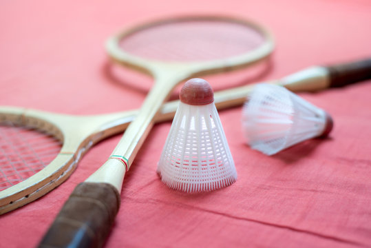 Set of retro badminton equipment (rackets and shuttlecocks), sport with long tradition, now on olympic games