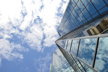 Ottawa, Canada - September 2, 2016: The glass skyscrapper reflecting the clouds in Ottawa downtown