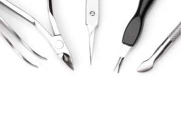 Tools of a manicure set on white background