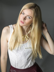Fototapeta premium young blonde women closeup portrait in studio