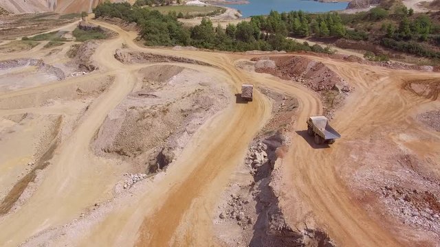 Drone make a perfect trajectory following heavy truck full with magnesium ore