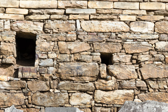 stone wall in Chavin de Huantar, Peru