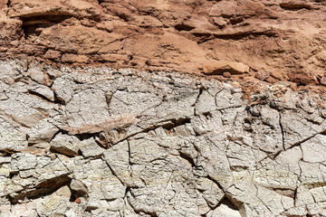 natural wall of stone and clay