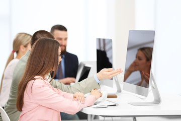 People working on computers at a office