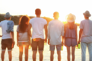 Group of friends looking at sunset