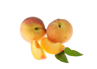Fresh peaches on a white background