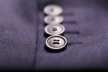 Buttons on shirt, close up