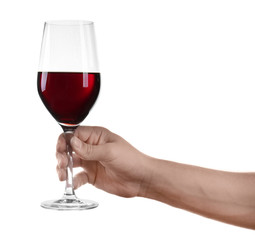 Man hand holding glass of red wine on white background