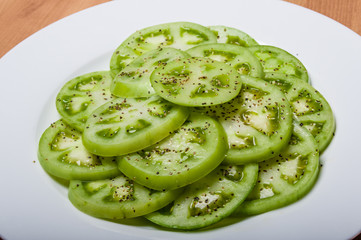 Sliced green tomatoes from the garden