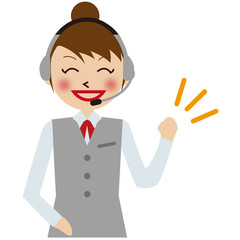 ヘッドセットをするグレーの制服の女性オペレーターがガッツポーズ
