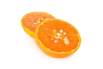 half cut orange on white background