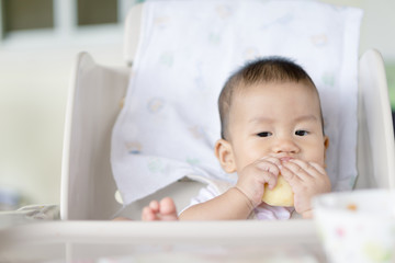 Asian baby feeding time