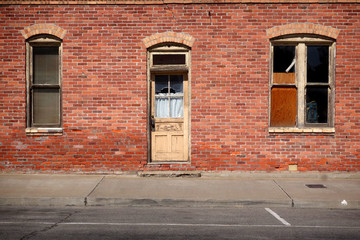 old vintage brick building with door