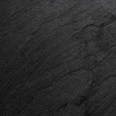 Dark grey black slate background or texture.