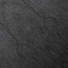 Dark grey black slate background or texture.