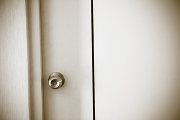 door Knob on white Wooden Door