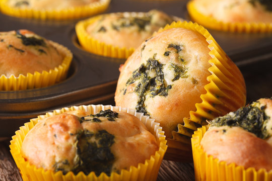 Healthy muffins with spinach and feta cheese macro. horizontal
