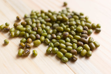 green mung beans on the wooden table