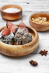 Dessert of pears in chocolate