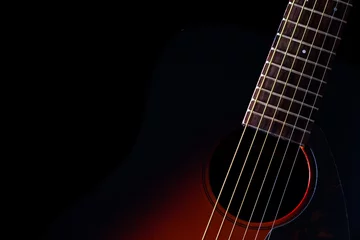 Rolgordijnen sunburst acoustic guitar & beautiful rim light of six strings, frets and body shape, isolated on black for music background © princeoflove