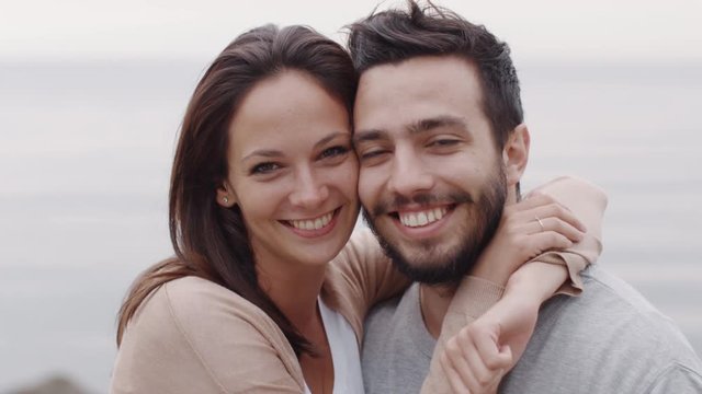 Portrait of Happy Smiling Attractive Couple Outdoors. Shot on RED Cinema Camera in 4K (UHD).