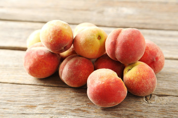 Fototapeta na wymiar Sweet peach fruit on grey wooden table