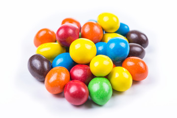 Chocolate covered peanuts in a candy shell isolated on white background