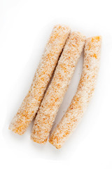 Coconut log candy isolated on white background