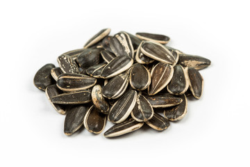 Unsalted roasted sunflower seeds  isolated on white background