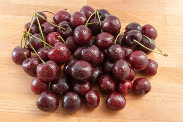 cherries on the wood tabel