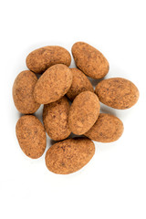  Cocoa dusted almonds isolated on white background