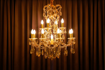 shining chandelier and curtain