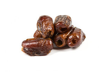 Whole pitted dates isolated on white background